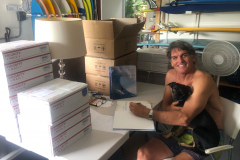 buzzy-manning-his-online-book-sales-in-his-garage-north-shore-oahu